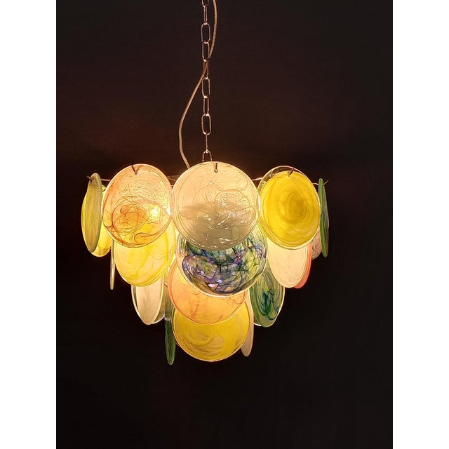 Vintage murano chandelier, mazzega style, 1980s. The glass is made of stunning alabaster discs, in pink alabaster, white...