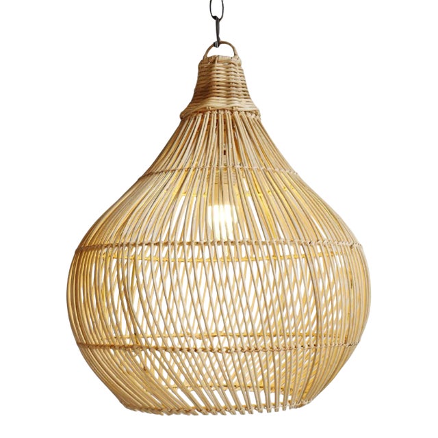 Raw rattan hand woven drop pendant lantern. Each lantern may have variations in natural tones/imperfections and handmade...