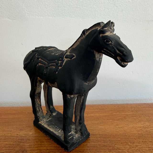 Handsome Chinese black pottery tang horse, unglazed. Circa 1980s. Please see condition details noted. Most items found at...