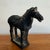 Handsome Chinese black pottery tang horse, unglazed. Circa 1980s. Please see condition details noted. Most items found at...