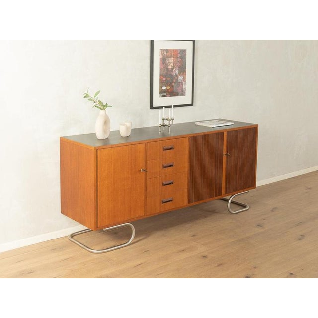 1960s Sideboard, DeWe excellent craftsmanshiphigh-quality materialssolid wood drawersMade in Germany, manufacturer:...