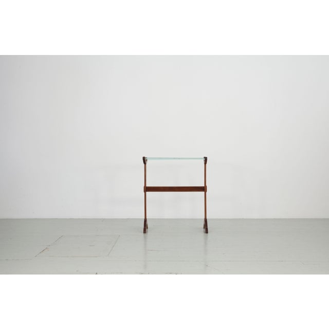 Antique freestanding wooden towel rack with glass rods - ideal for drying towels in the bathroom.