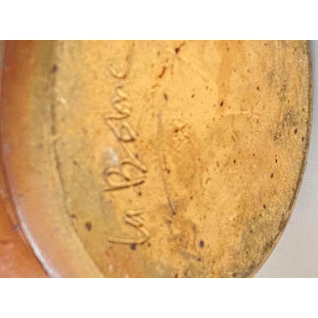 Jug or pitcher, with an exceptional patina. It's color with brown gives very pleasant contrasts. This Pitcher was created...