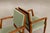 : This elegant pair of Brazilian armchairs combines architectural clarity with the warmth and expressive character of aged...