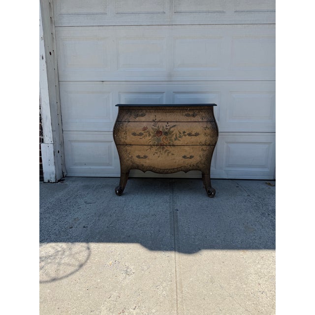 We have a beautiful vintage French Louis XV style bombe chest of drawers for sale. It features a beautiful floral design,...