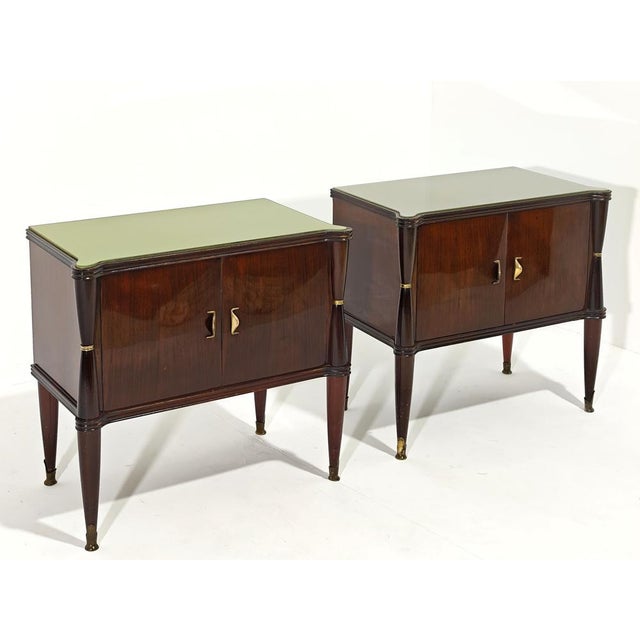 In the style of Vittorio Dassi, Italian design from the 1950s. Pair of vintage wooden bedside tables with back-treated...