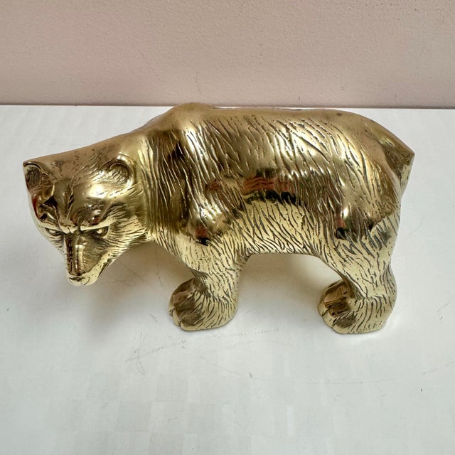 A stunning heavy solid brass bear statue. This is a rare piece with strong character and vintage charm. C.1970's.
