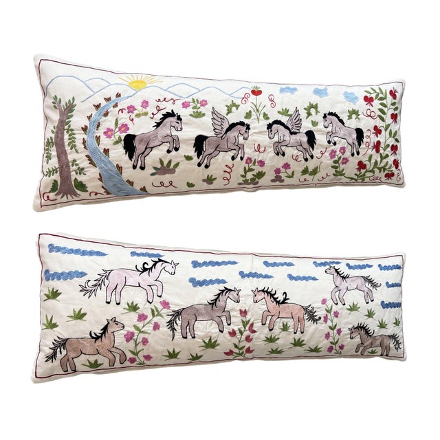 This beautiful 17'' x 52'' & 18'' x 53'' hand-embroidered Suzani pillow cover set was made from authentic Uzbek cotton...