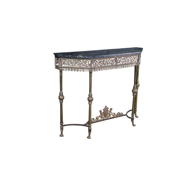 Mid century Oscar Bach bronze, wrought iron and marble console table featuring neoclassical styling with a reticulated /...