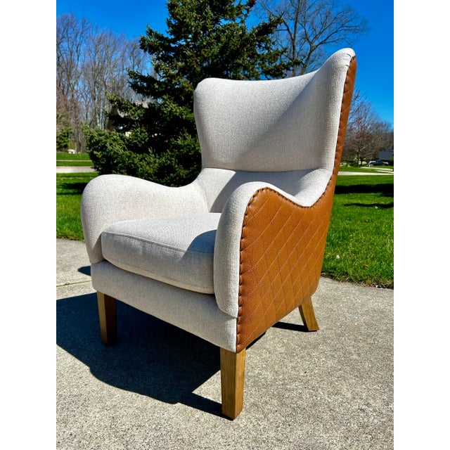 Contemporary Lillian August Style Wingback Chairs, Pair – Oatmeal Beige Mistral Upholstery, Diamond-Stitched Faux Leather, Nailhead Trim For Sale - Image 3 of 11