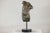 This small bronze male torso is modeled in the classical tradition, presenting a fragmented figure with well-defined...