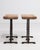 Originating from France and dating to circa 1970, this distinguished pair of oak side tables exemplifies the clean,...