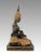 An early 20th. Century reproduction styled upon figures from the Thai Rattanakosin Kingdom 1782-1932. This seated female...