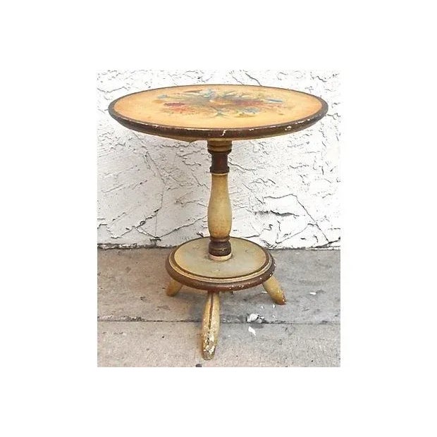 Vintage, Italian, hand-painted, round, floral footstool with turned and painted legs and neck. Hand-painted florals are...