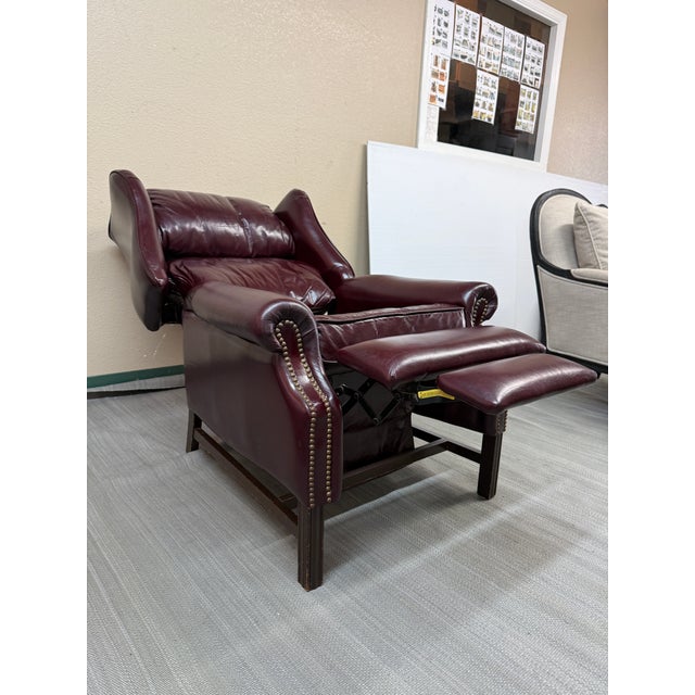 Design Plus Gallery presents a Chippendale Style Hi-Leg Burgundy Leather Recliner from Bradington Young. This is a classic...