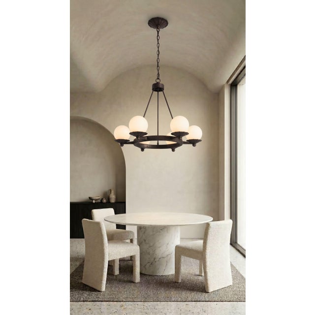 A Brutalist-inspired lamp with subtle Art Deco influences, this piece boasts a strong sculptural character, combining...