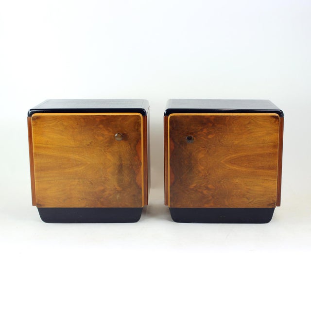A striking pair of fully restored bedside tables from czechoslovakia, dating from the transitional period between late art...