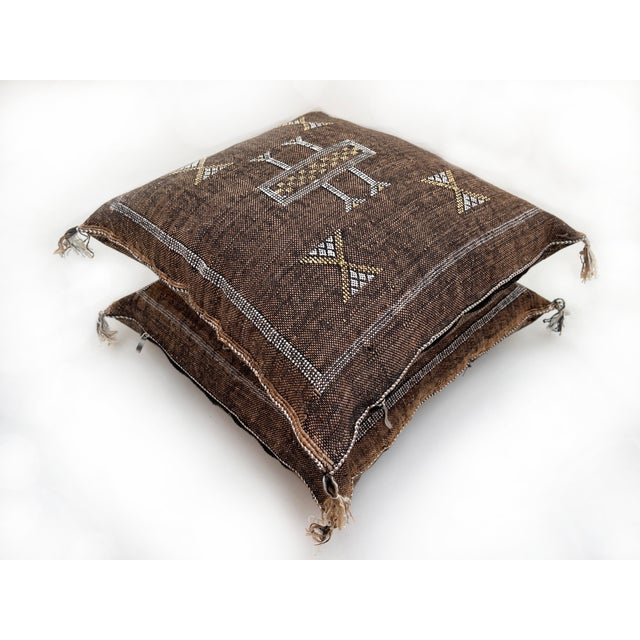 The Moroccan Cactus pillow is a masterpiece handcrafted by local Berber artisans. This carefully decorated pillow is a...