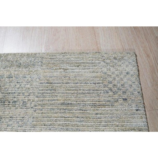 This Green Silk rug features a Hand Knotted Pile weave designed to meet the requirements of contemporary interiors....