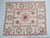 This bedcover is made with vintage Suzani textiles and has just the right pop of color. We see it folded at the end of a...