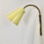 Article: wall light with yellow shade Origin: Italy Age: 1950s This modernist light was produced in Italy in the 1950s in...