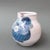 A decorative ceramic pitcher with bouquet of flowers motif by the cloutier brothers (circa 1970s). This charming pitcher...