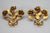 - Italian gilt metal rose-shaped coat hooks, a pair, from circa the 1960s - A pair of beautiful Hollywood Regency-style...