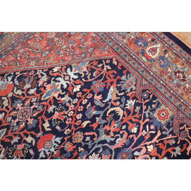 An early 20th century Persian Mahal rug. Measures: 10'6'' x 13'3''.