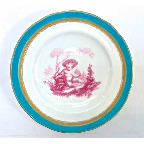 Set of six antique Minton porcelain cherub plates. Plates depict cherubs doing various hunting activities. Gilt weave...