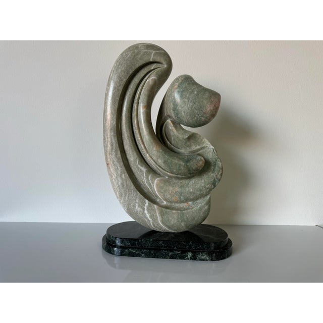 Vintage Abstract free-form hand-carved marble Sculpture. Offered for sale is a vintage free-form abstract hand-carved...