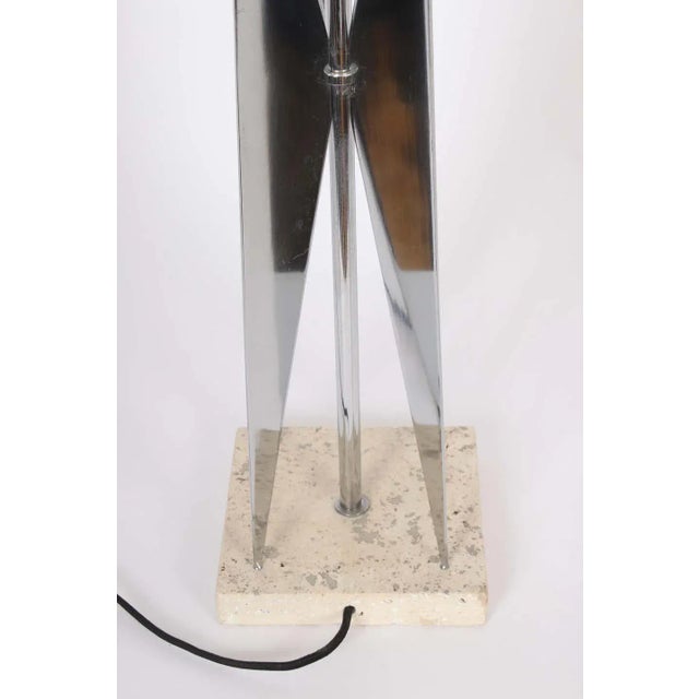Futurist Maurizio Tempestini angular Chrome Table Lamp with Travertine base. Tall kite form structure in reflective Chrome...