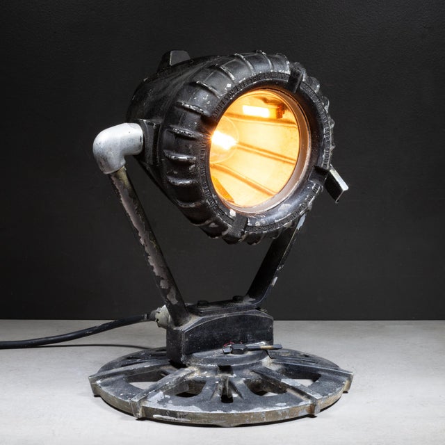 ABOUT A vintage industrial explosion-proof spotlight originally designed for working in oil fields and hazardous...