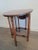 This 19th-century, Victorian Sutherland, drop-leaf table is made of hand-carved, solid walnut. The Gateleg design feature,...
