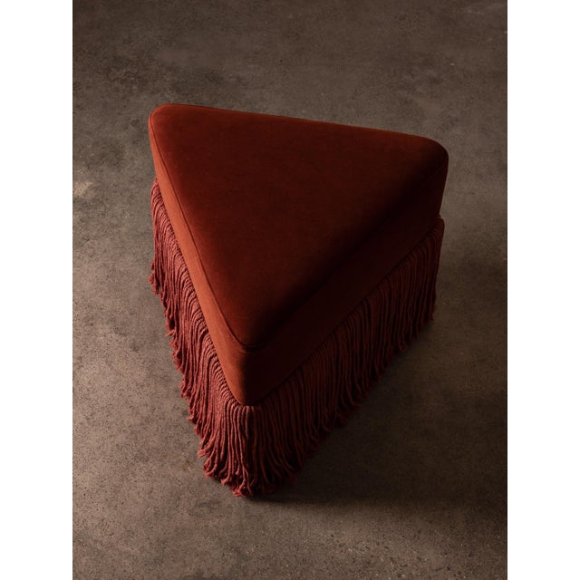 Charged with the hushed allure of tassel and texture, the Allard Ottoman couples comfort and sophistication with...