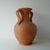 Vintage circa 1980s Italian terracotta amphora vase. This ceramic hand thrown large vase has two sculptural ribbon style...