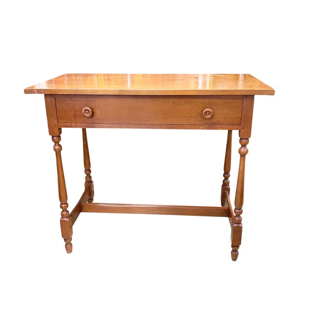 Vintage 1960s American Colonial Solid Cherry Wood Tavern Writing Desk This authentic antique tavern table exemplifies mid-...