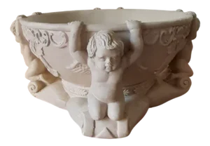 Centerpiece with Putti Decor