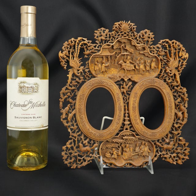 An amazingly elaborate hand carved Chinese wood frame from the early 19th century that is so over the top. The carving is...