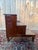 Three-step English mahogany library staircase with built-in storage chests beneath a hinged-lidded step. Constructed in...