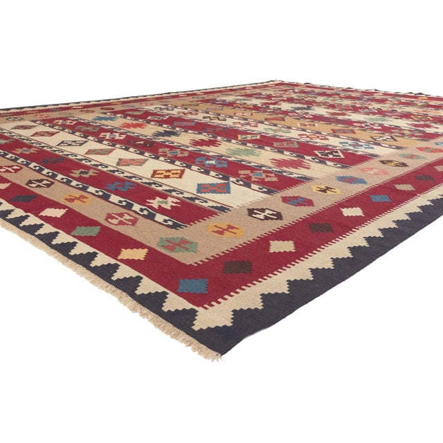 78605 Vintage Persian Shiraz Tribal Kilim Rug, 09'10 x 12'11. Emanating nomadic charm with incredible detail and texture,...