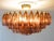 This prismatico glass chandelier in amethyst is the compact version of the prismatico collection, featuring 91 blown glass...