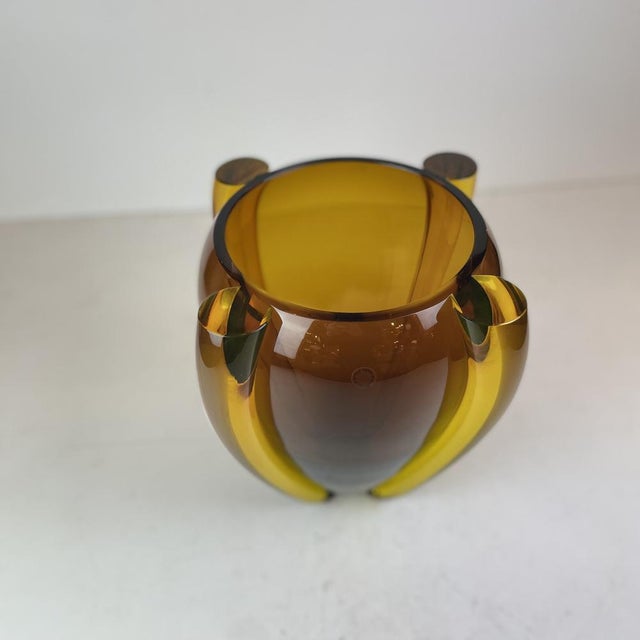 Rare, beautiful, large vase made of amber blown-Murano-glass. Named Albino, it was designed by American artist and...