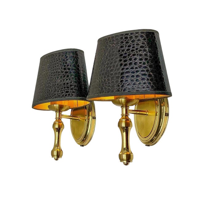 Chique set of 70’s Wall Lights in Golden Brass with Faux Leather dark brown oval lampshades. Made by Herda Lamp Atelier...