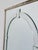 Height: 116 cm / 45.7 in Width: 75 cm / 29.5 in Depth: 2 cm / 0.8 in A striking large decorative wall mirror with a strong...