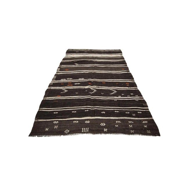 Vintage handwoven decorative kilim rug from Afyon region of Turkey. Approximately 50-60 years old. In very good condition.