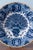 Diameter: 31 cm Height: 6 cm Some chips and glaze losses to the edge. Marked for the De Klaauw factory underneath.