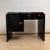 Elegant small Art Deco desk from France, circa 1930. High-gloss black piano lacquer. Original, newly nickel-plated metal...