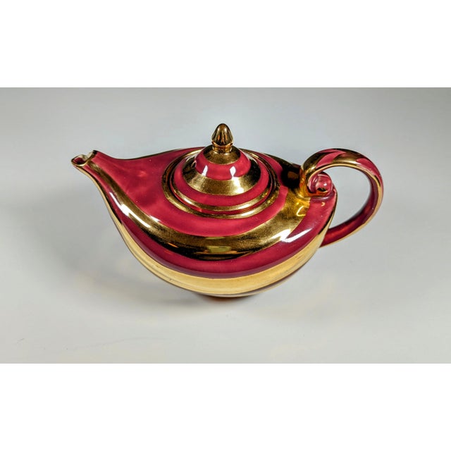 This is a rare vintage 1950's Arthur Wood striped Aladdin teapot made in England. The teapot features a beautiful gold and...