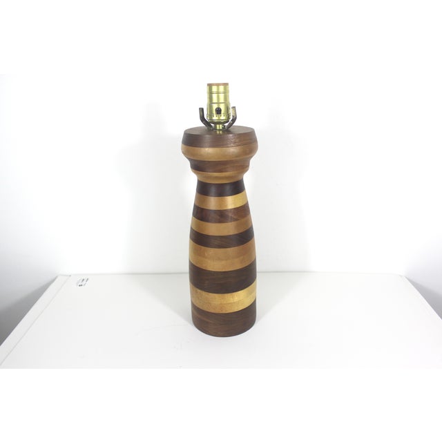 This is a vintage handmade hand turned stacked marquetry wood table lamp. The wiring is old, but in good shape and the...