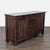This Pottery Barn sideboard has a rich, rustic wood finish. It features three central drawers and two side cabinets with...